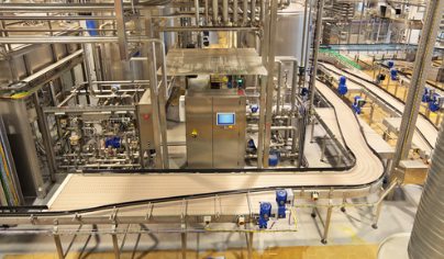 Steel above open product — grit can never fly