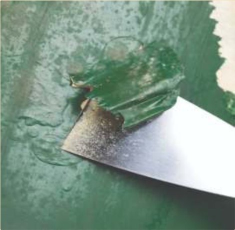 Bonded gasket and paint lifted off, with no damage to the metal.