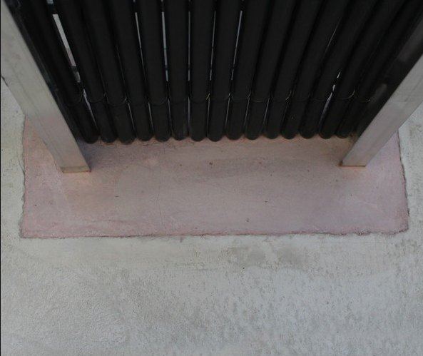 A wall opening fire-stopped with castable mortar.