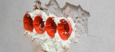 Wall gaps foam-sealed against pests, dust and damp.