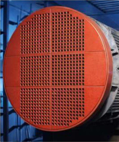 A tube end sheet rebuilt, overcoated and back in service.