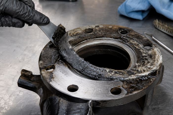 Bonded gasket and paint lifted off, with no damage to the metal.