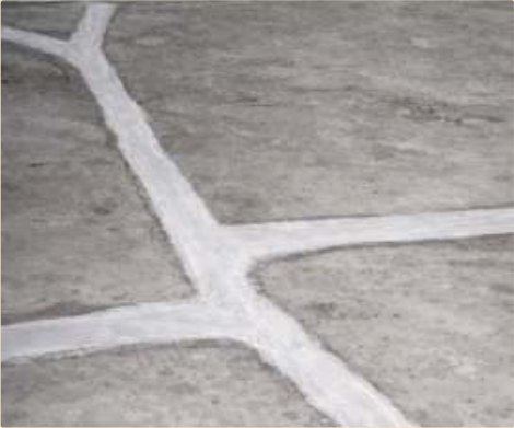 Floor and foundation cracks filled to 50 MPa; trafficable in four hours.