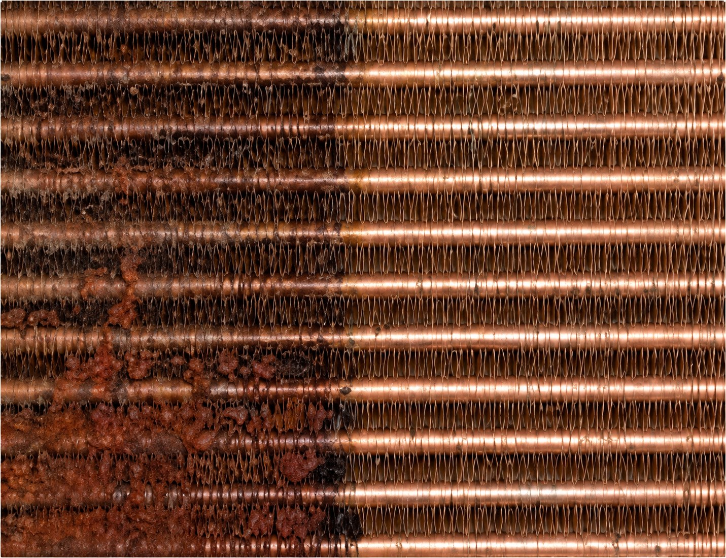 Scale and rust off copper fin tube — safely, with no acrid fume.