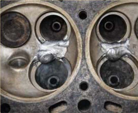 A cast-iron cylinder head welded cold — no oven, no distortion.