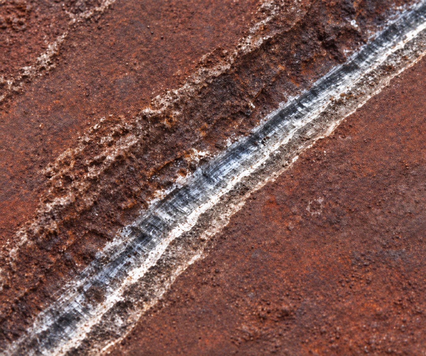A clean U-groove gouged at low amperage and low HAZ.